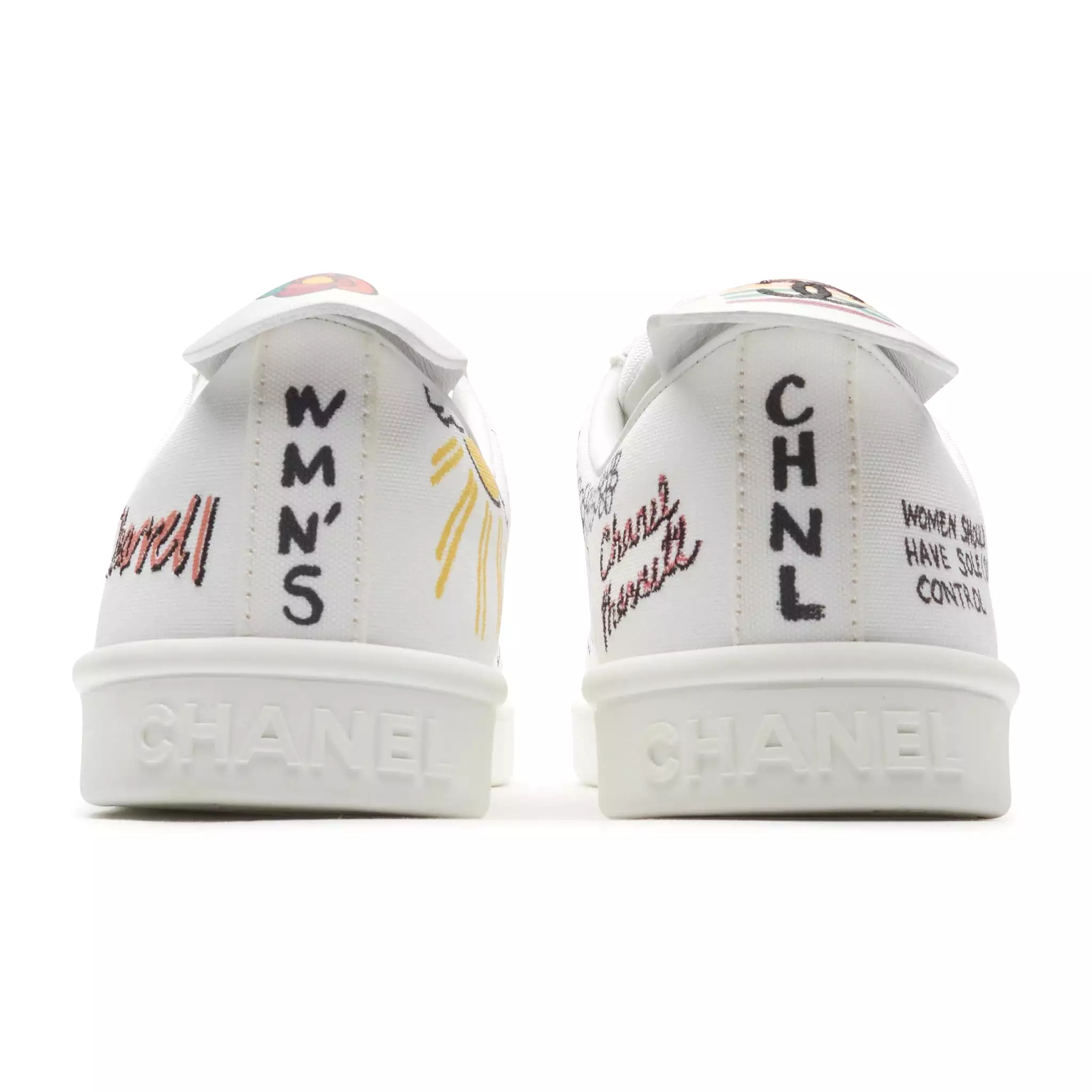 Chanel Pharrell white canvas sneakers preloved.