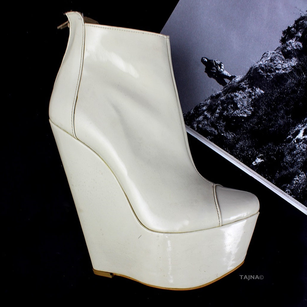 Cream patent leather wedge booties