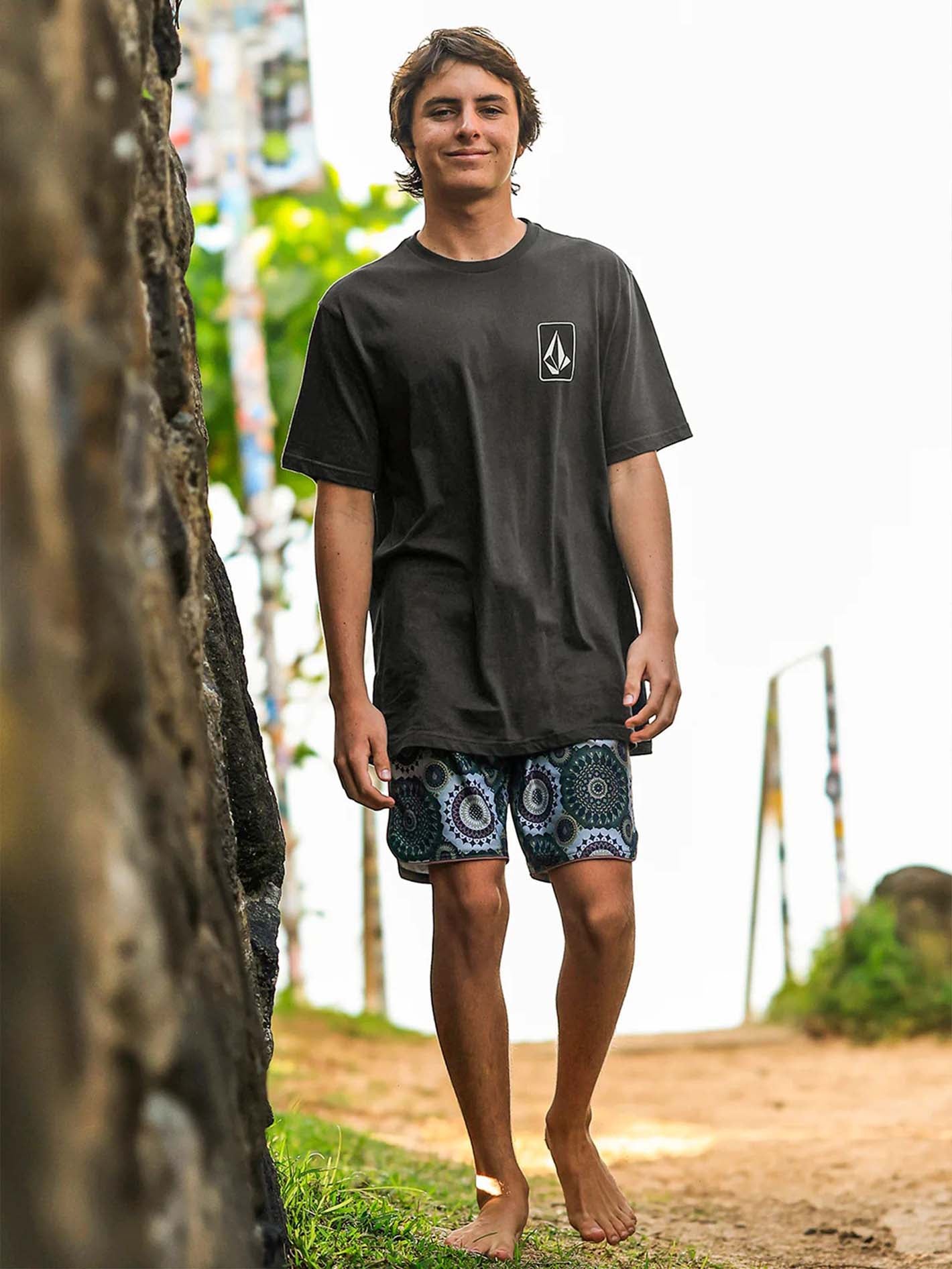 Polo shirt for men, Volcom brand, designed for skateboarding, featuring the Vital Originator logo, short sleeve style.