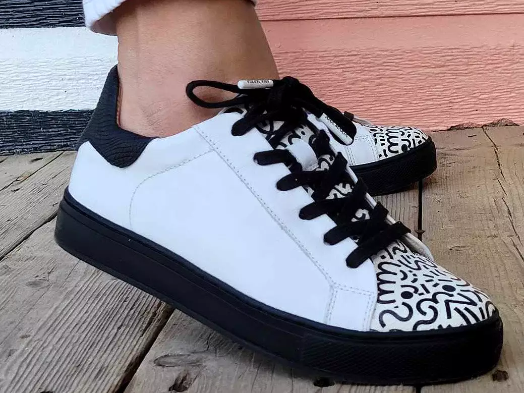 White Leather Sneaker is the requested result.