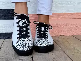 White Leather Sneaker is the requested result.